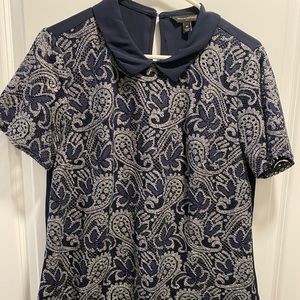 Peter Pan collar blouse.